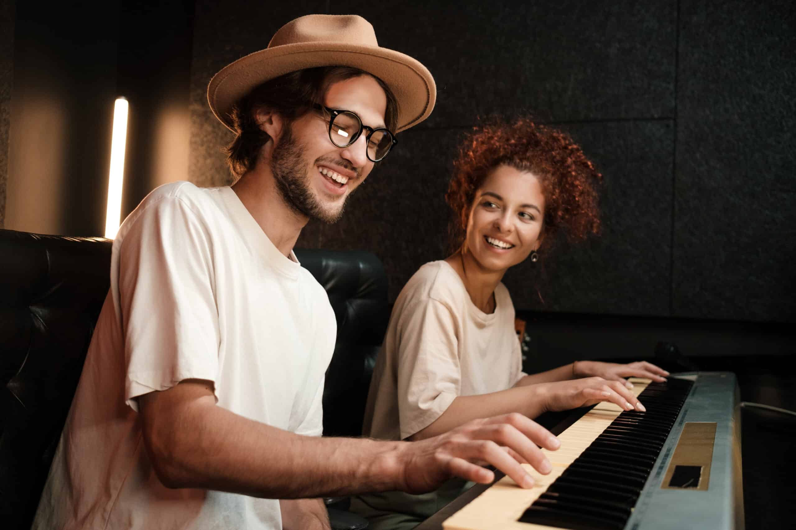 Young,Stylish,Musicians,Happily,Playing,On,Piano,Keyboard,Recording,Song